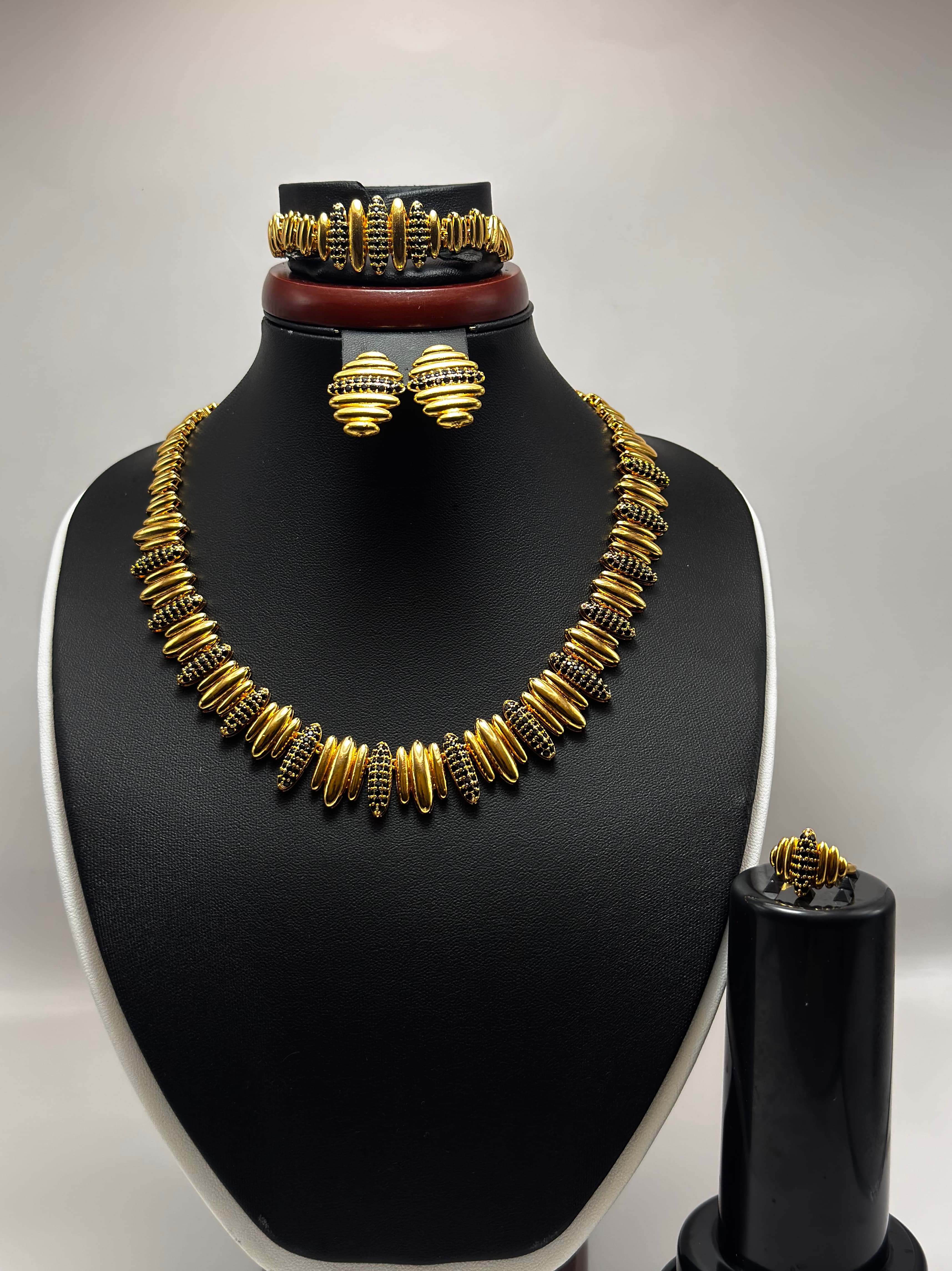 Gold and black jewelry set